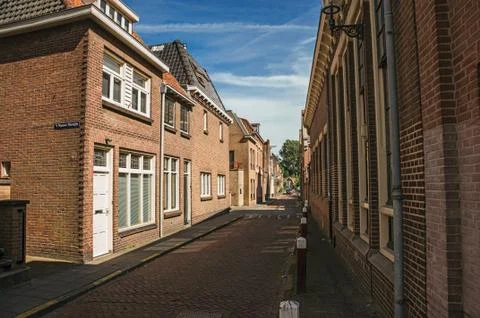 Working-class brick houses in an empty street at Weesp Stock Photos