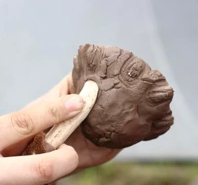 Working with clay Stock Photos