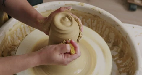 Working with clay on a potters wheel Stock Footage 278727898