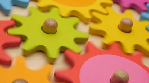 Working for common goal, conceptual. Gears and cogs in action. Side top view Stock Footage 132015680