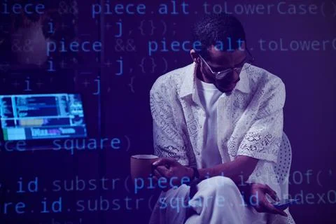 Working on Computer Code in Modern Office Environment Stock-Fotos