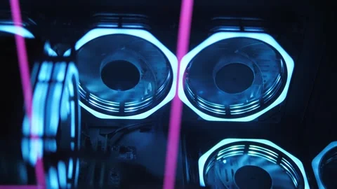 Working of computer cooling fan, the blue light. Gaming pc glowing in the dark. Stock Footage 330869602
