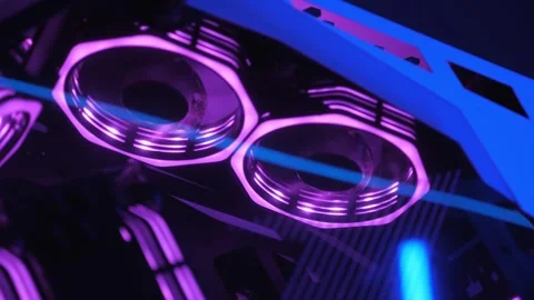 Working of computer cooling fan, the blue light. Gaming pc glowing in the dark. Stock Footage 331147206