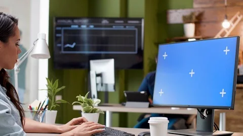 Working on a computer with a isolated mock-up Stock Footage 112654564