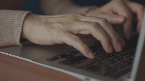 Working on Computer Laptop in House or Cafe. Closeup of Woman Hand Typing Key 库存影片 130048283