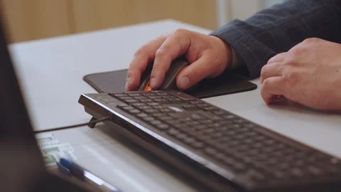 Working with a computer mouse, controlling a computer mouse Stock Footage 277830542