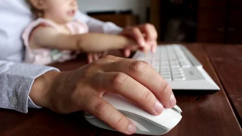 Working with computer, typing with child Stock Footage 76680540