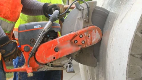Working concrete saw Stock Footage 135999099