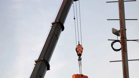 Working construction high-altitude working crane on the construction site with Stock Footage 164407898