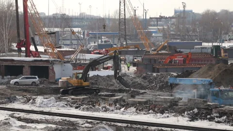 Working in Construction Site, Excavator digging into the ground Stock Footage 151379781