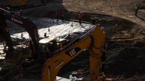 Working at a construction site, two excavators working side-by-side Stock Footage 88618665