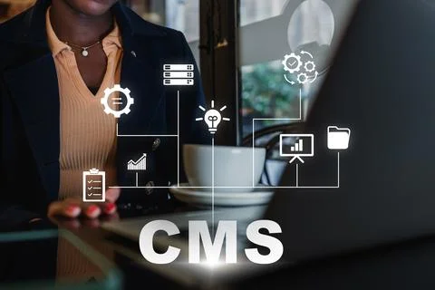 Working with content management system tools in an office setting during the day Stock Photos