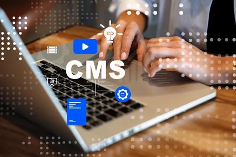 Working on a content management system using a laptop at a desk Foto stock