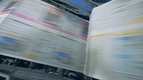Working conveyor moves printed newspaper in a typography facility. Stock Footage 113552393