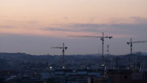 Working cranes on rome skyline during sunset full hd Timelapse Stock Footage 103344789