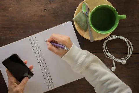 Working creative table and hot green tea drinking Stock Photos