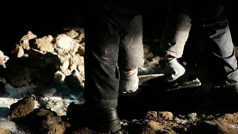 Working with a crowbar trying to break the iron cover Stock Footage 73802978