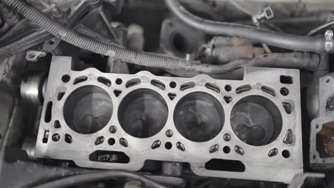 Working cycle of open block of four cylinder petrol engine in repair mechanic Stock Footage 241669953