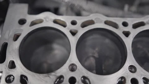 Working cycle of open block of four cylinder petrol engine in repair mechanic Stock Footage 241669968