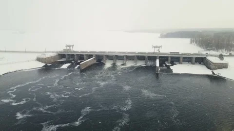 Working dam during snowfall in winter. aerial drone footage Stock Footage 172007454