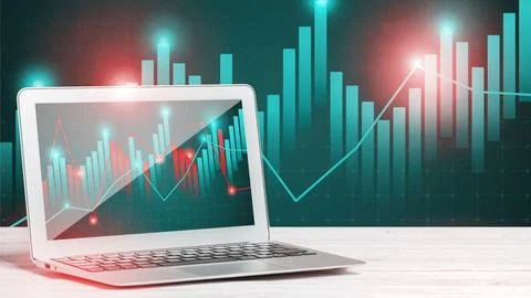 Working with data on a laptop while looking at graphs and charts in green and Stock Photos