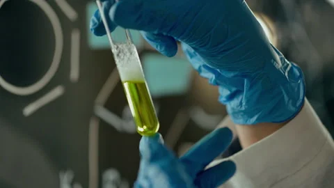 Working with data on a transparent wall in a research center, a skilled work Stock Footage 260224422