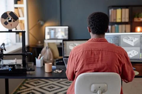 Working in Design Studio with Multiple Computer Screens Foto stock