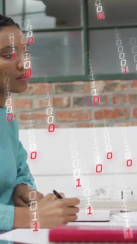 Working at desk, businesswoman surrounded by binary code animation, focused on 動画素材 344244810