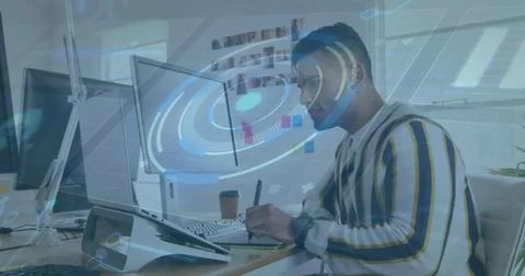 Working developer in striped sweater at desk inspecting AR overlay on laptop, 스톡 사진