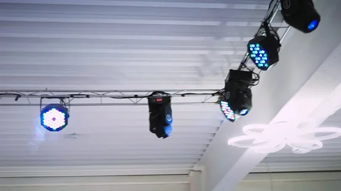 Working devices for disco light under a white ceiling attached to the farm Stock-Footage 97722607