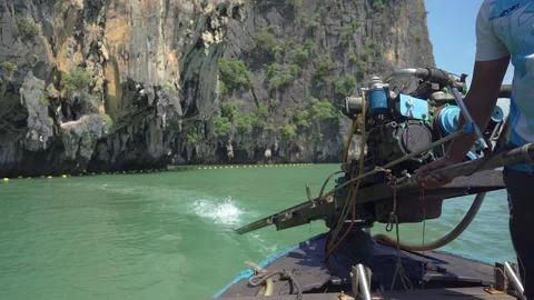 Working Diesel Engine of Long Tail boat at Phang Nga Bay 動画素材 144863987