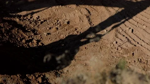 Working digger and his shadow Stock Footage 167052769