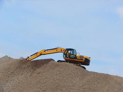 Working digger Stock Photos