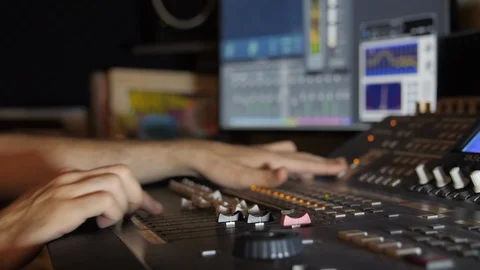 Working on a digital mixing board, recording studio Видео 90728901