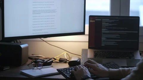 Working from the Digital Space: A Programmer's Desk Stock Footage 235409301