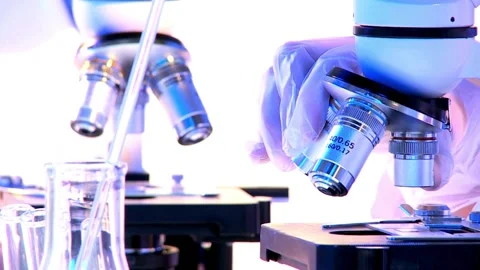 Working diligently in a high-tech laboratory, with the latest technology Stock Footage 336582619