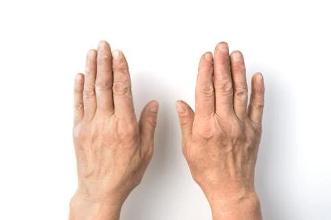 Working dirty hand of an elderly man close - up on a white background. Stock Photos