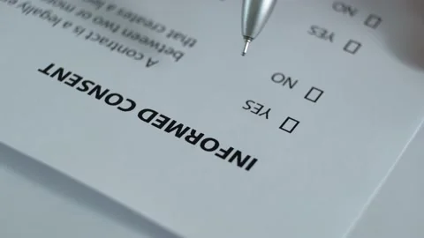 Working with the document Informed Consent. Stock Footage 157532887