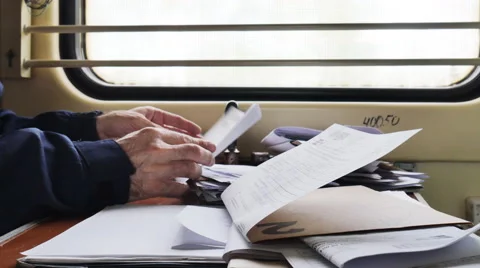 Working with documents in a mail car timelapse Stock Footage 63043177