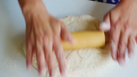 Working with dough with rolling pin. Demonstration of cooking skills at class Stock Footage 280562936
