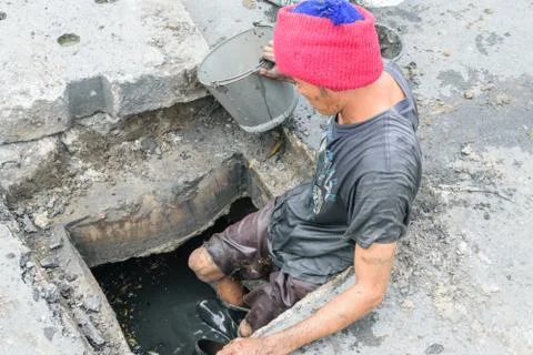 Working for drain cleaning Foto stock
