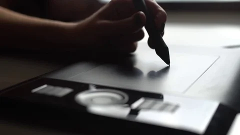 Working with Drawing tablet for a computer Stock Footage 69784303