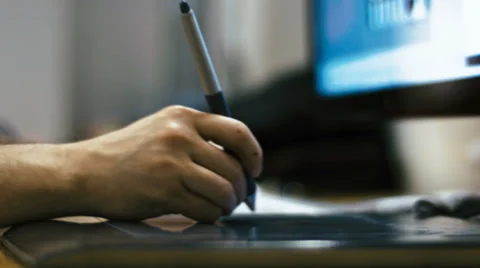 Working with Drawing tablet for a computer, Soft focus shot Stock Footage