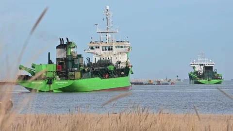 Working dredger ship at port construction in Gdansk Poland Stock Footage 237808155