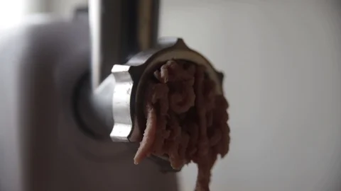 Working electric meat grinder Stock Footage 122584521
