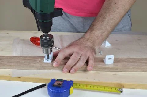 Working with an Electric Screwdriver Stock Photos