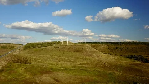 Working electric wind generators feeding the village Stock Footage 81513523