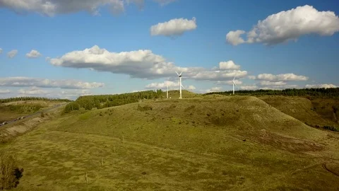 Working electric wind generators feeding the village Stock Footage 81514283