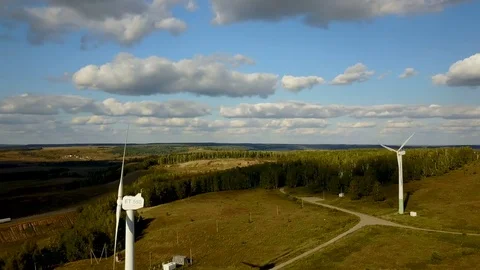 Working electric wind generators feeding the village Stock Footage 81516123
