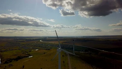 Working electric wind generators feeding the village Stock Footage 81517027